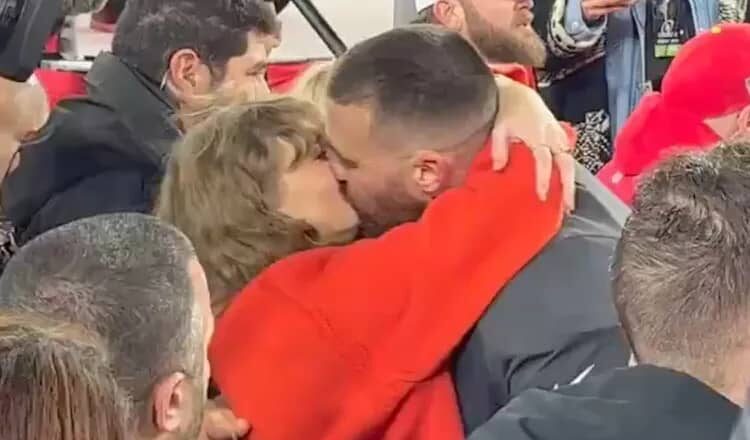 Travis Kelce Kisses Taylor Swift on the Field After He and Chiefs Clinch Spot in 2024 Super Bowl