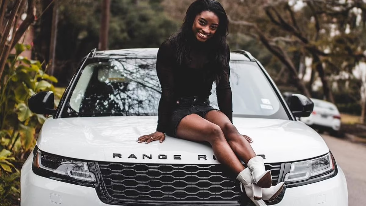 Simone Biles flaunts her Birkins, Range Rover and Texas mansion - but the $25million Olympic gymnast has given no hand outs to her penniless birth mom who works as a cashier to make ends meet