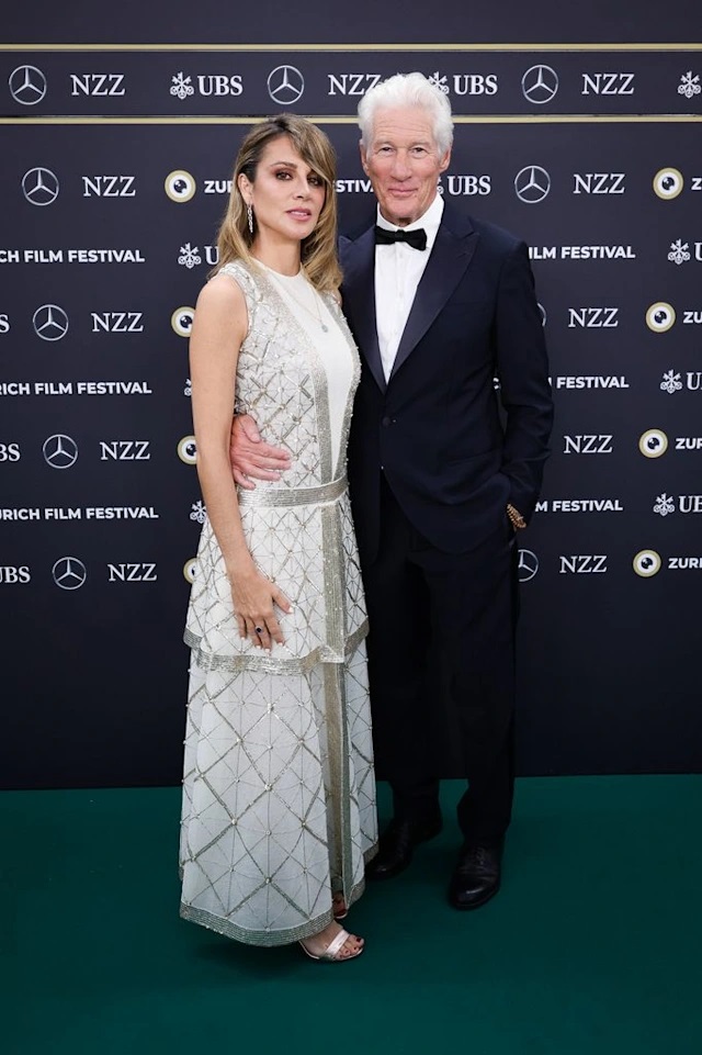 Richard Gere, 75, can't keep his hands off wife Alejandra, 41, as she wears bridal gown for red carpet