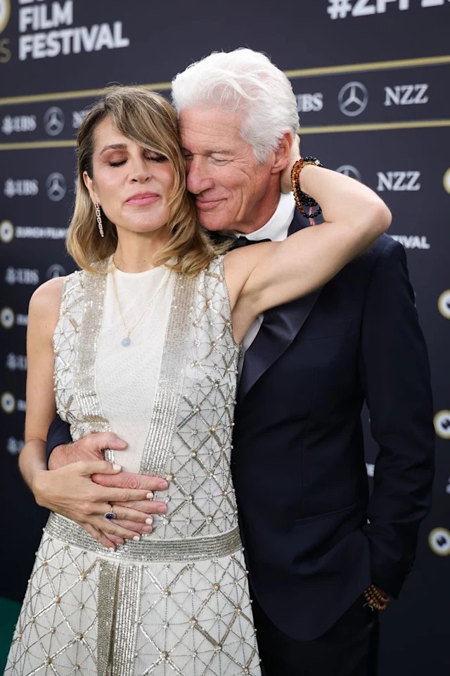 Richard Gere, 75, can't keep his hands off wife Alejandra, 41, as she wears bridal gown for red carpet