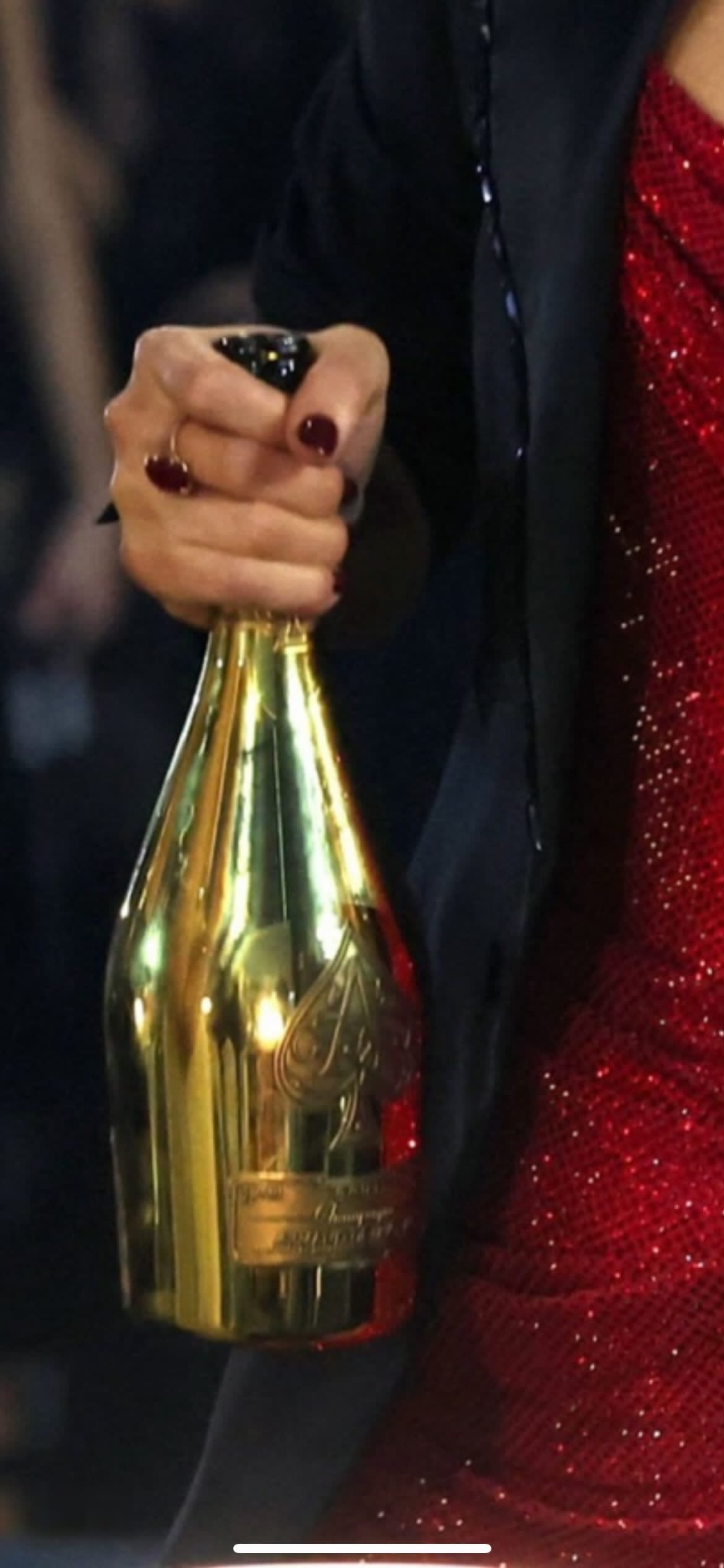 Breaking: The bottle of champagne Taylor Swift was holding at the Grammy is Jay-Z’s Armand de Brignac, sold  for $100k per bottle at the XS nightclub in Las Vegas' Encore casino and they bring it to all the shows they go to