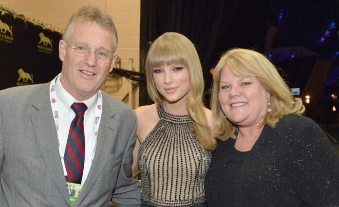 Taylor Swift parents has revealed that while the daughter [Taylor] was 'trying to keep it together,' it was obvious to that she has already 'falling' hard for her new beau. Travis Kelce