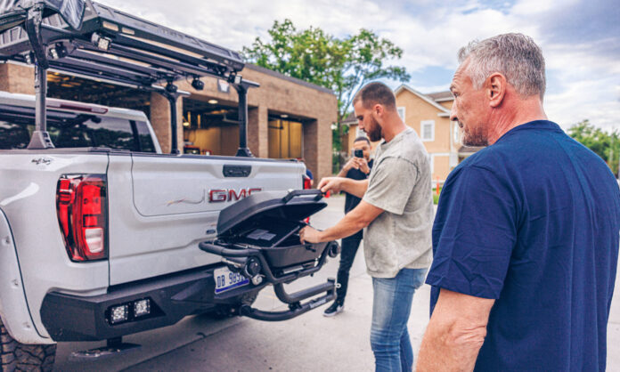 Travis Kelce gifts local firefighter and youth boxing coach “the ultimate tailgating truck”
