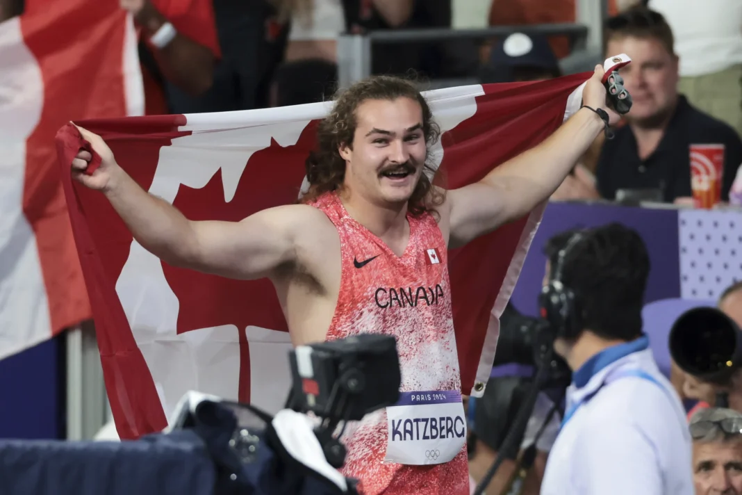 2024 Olympics: Aussies, Germans call for 'DNA test' as moustache-laden Canadian gold medalist Ethan Katzberg sets social media ablaze: Ethan Katzberg's hair and mustache game is almost as impressive as his hammer-throwing skills