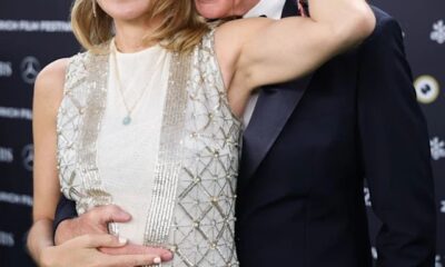 Richard Gere, 75, can't keep his hands off wife Alejandra, 41, as she wears bridal gown for red carpet