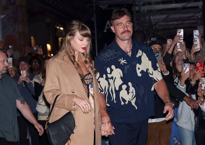 Taylor Swift abandons Eras Tour in Indianapolis as she arrives holding hands with Travis Kelce at Arrowhead stadium for Chiefs vs buccaneer game